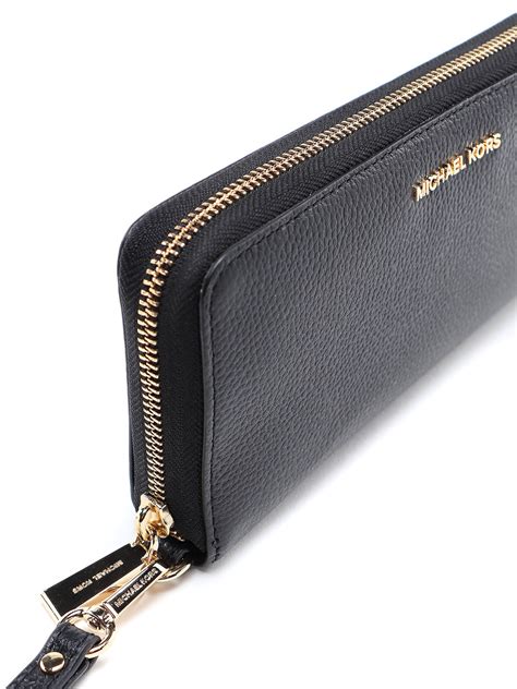 michael kors jet set travel continental wallet black|Michael Kors silver metallic wallet.